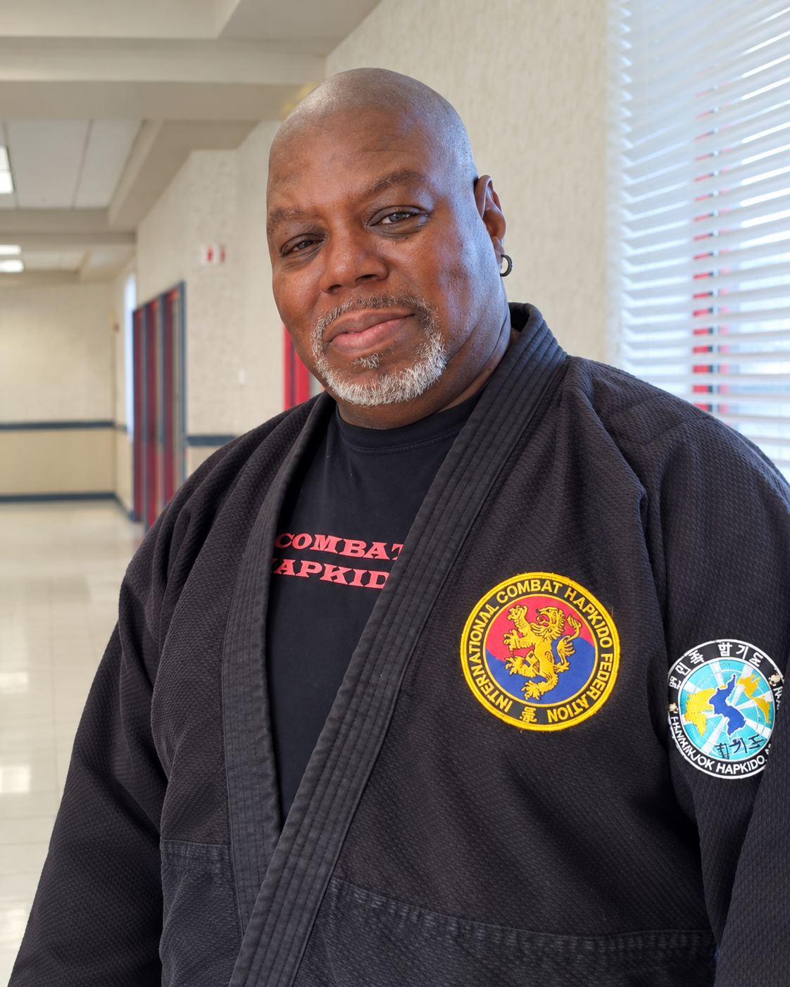 James Brown wearing his black Hapkido uniform.